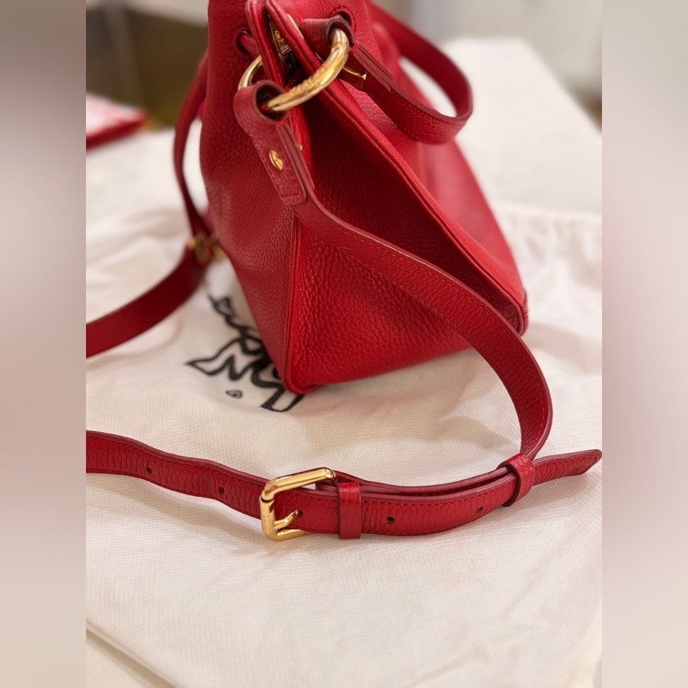 MCM Red Leather Bucket Bag
Crossbody Drawstring Gold Hardware - Picture 8 of 17